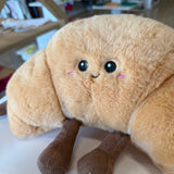Smiling Croissant Stuffed Animal