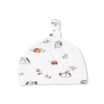 Baby hat with farm animal pattern on a white background