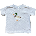 Gray t-shirt with a duck graphic on a textured surface