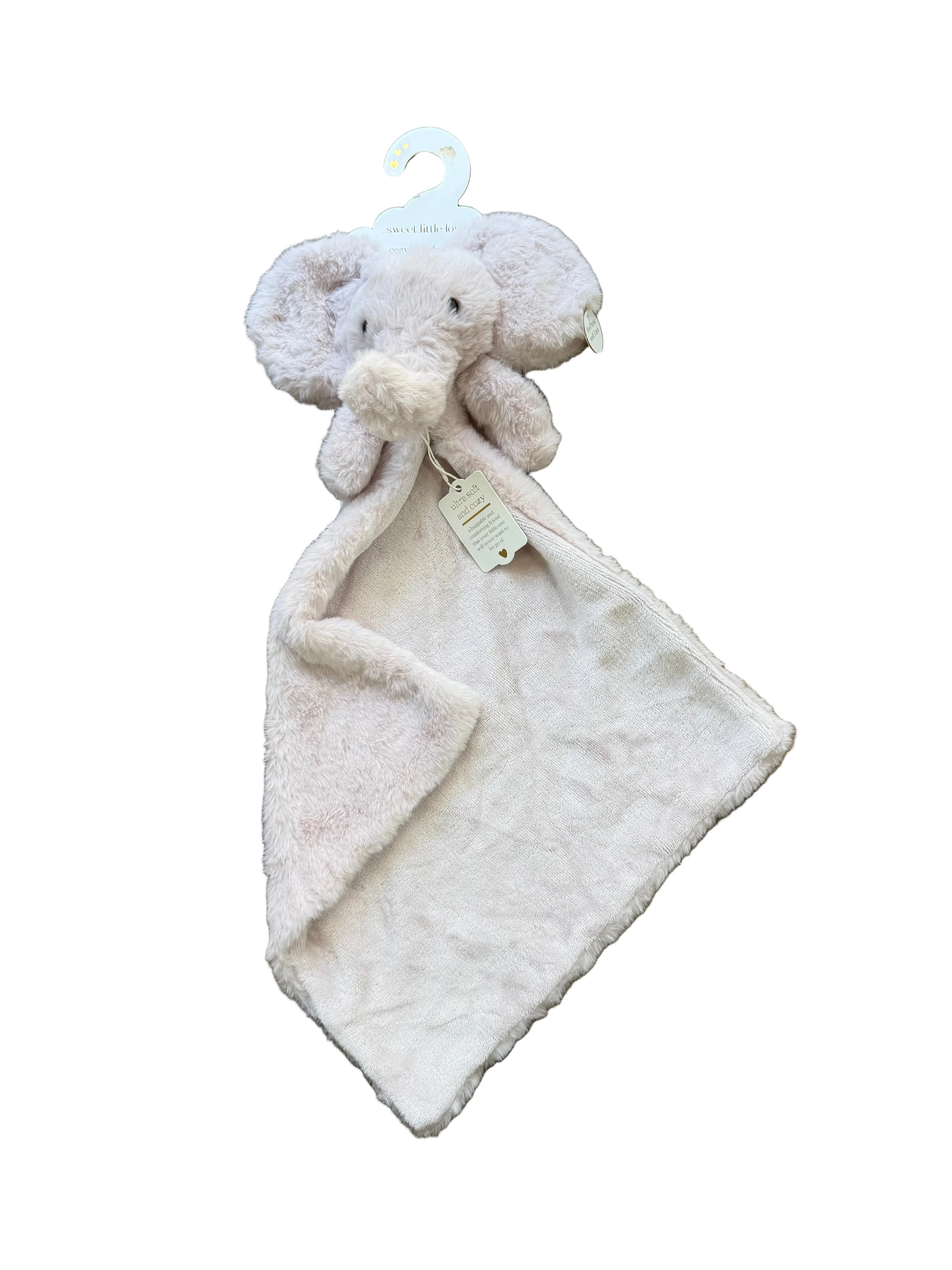 Plush elephant toy with blanket on a hanger on a wooden floor