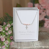 Pastel Pink Faceted Pearl Cross Necklace