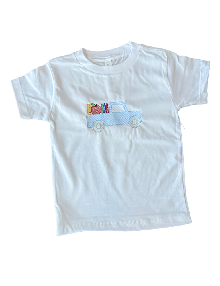 A white short-sleeved toddler t-shirt with a blue truck and school-related items embroidered on the front.